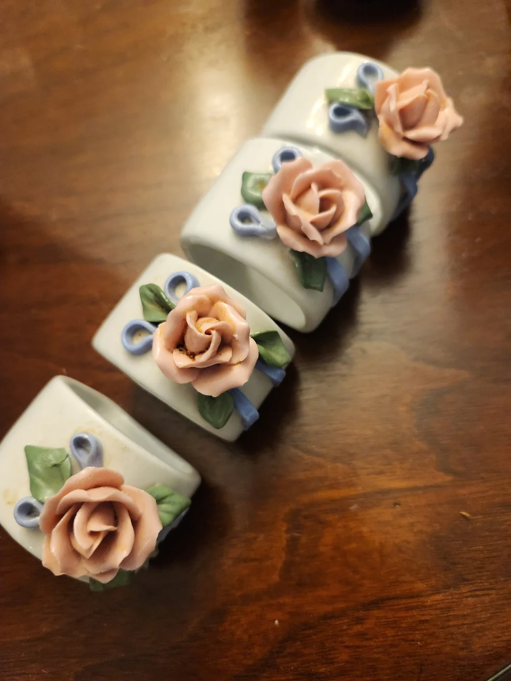 Source Unknown Porcelain Napkin Rings with Pink Roses and Blue Accents